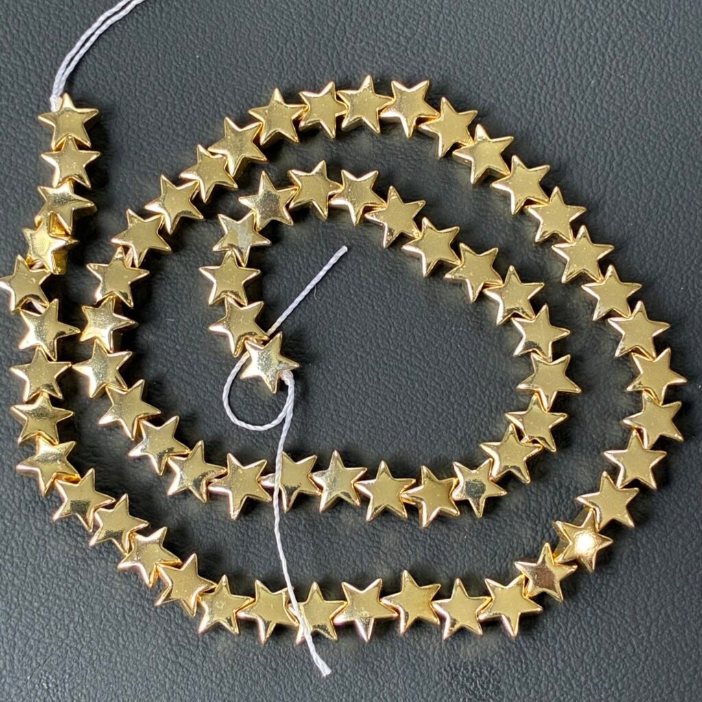 Hematite Gold Star S size, 8 mm, 40 cm